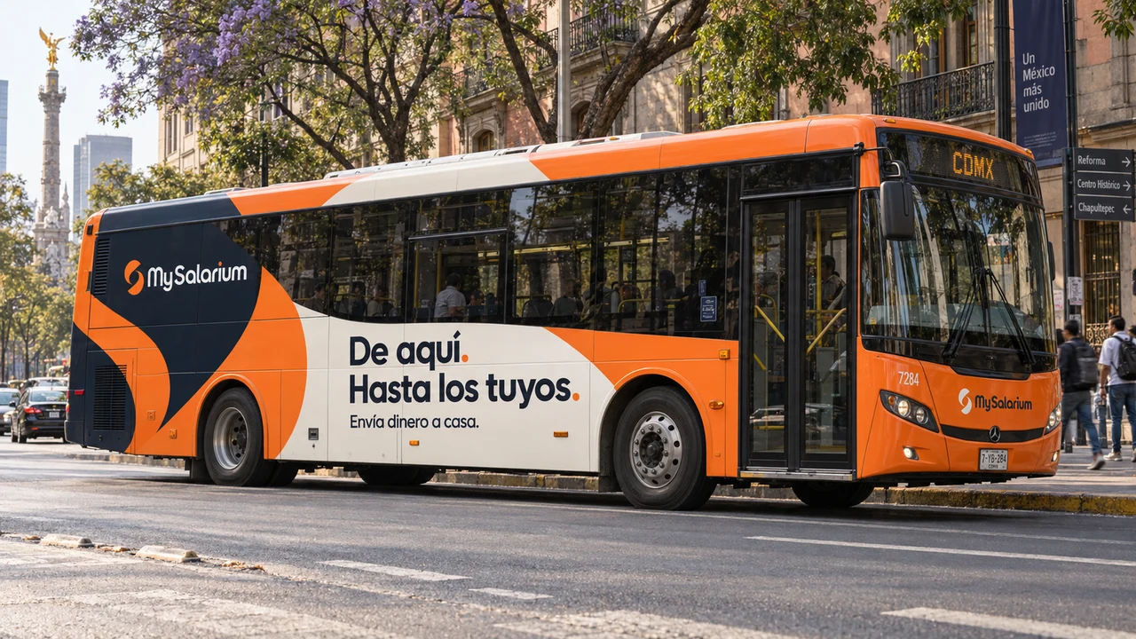 MySalarium orange, cream and navy brand identity on a bus in Mexico City